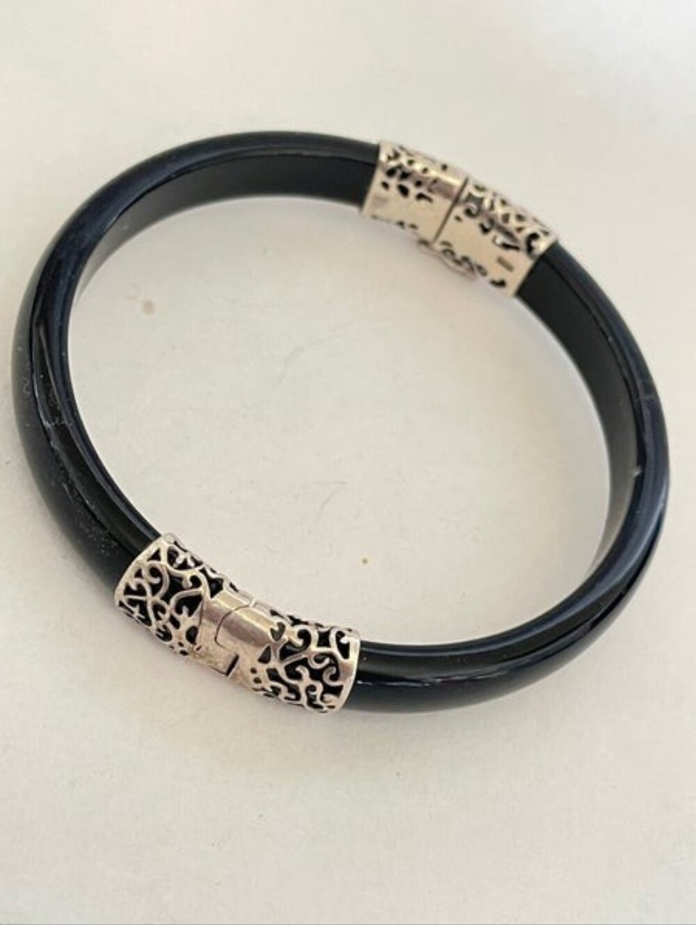 Black Bracelet with Decorative Silver-Tone Clasp